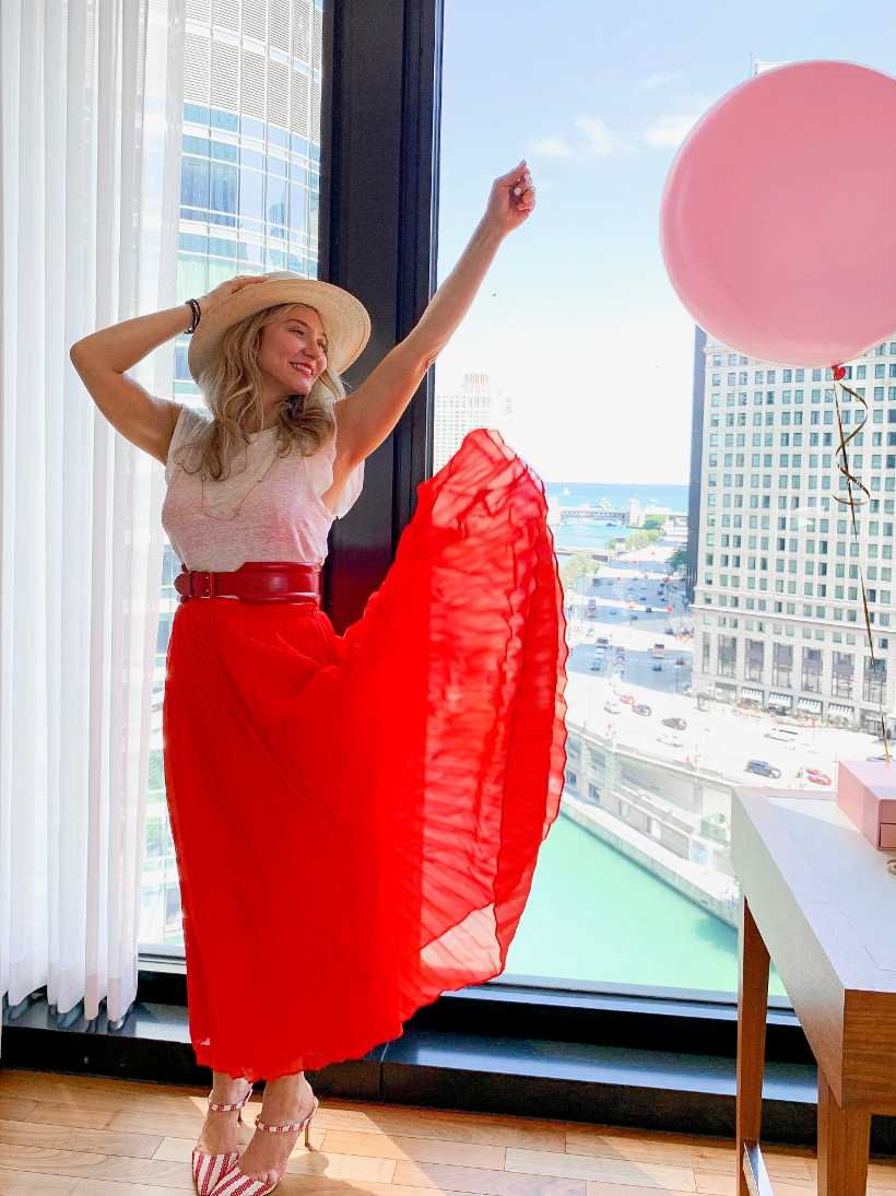 red pleated skirt