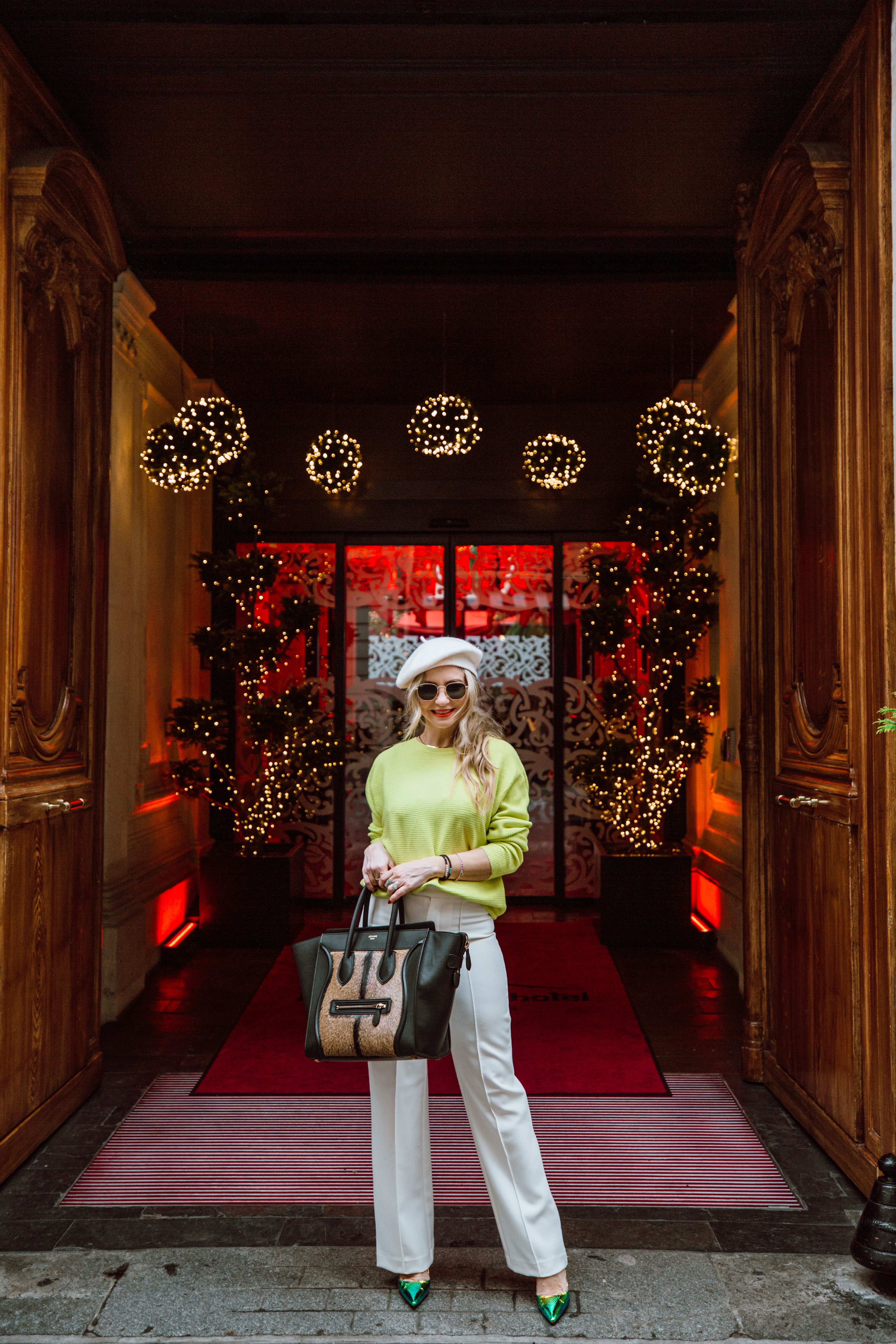 wide leg trousers, a neon sweater, iridescent pumps, Celine tote, and of course, an ivory beret. 